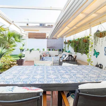 Adosado En *